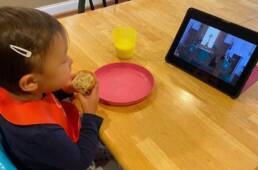 child watching Zion UCC worship on an iPad